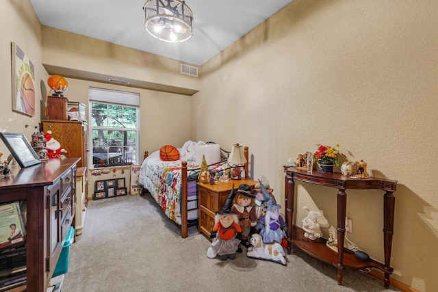 513 2nd Ave SW, Lonsdale, MN 55046 - carpeted bedroom with a textured wall