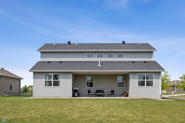 2200 39th St S, Moorhead, MN 56560 - back of house featuring a patio area and a shingled roof