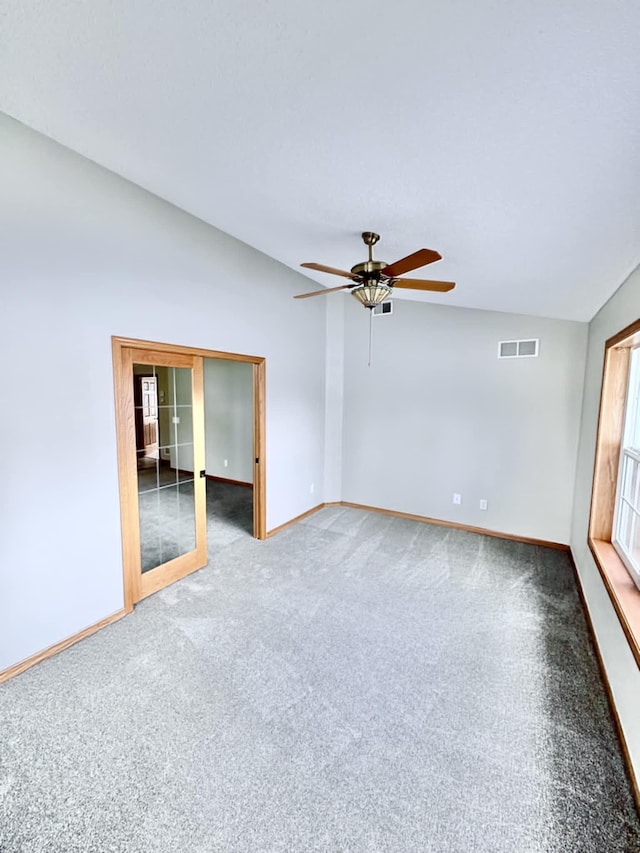 1855 Pioneer Ln Unit 1855, Centerville, MN 55038 - unfurnished room with lofted ceiling, ceiling fan, and carpet flooring