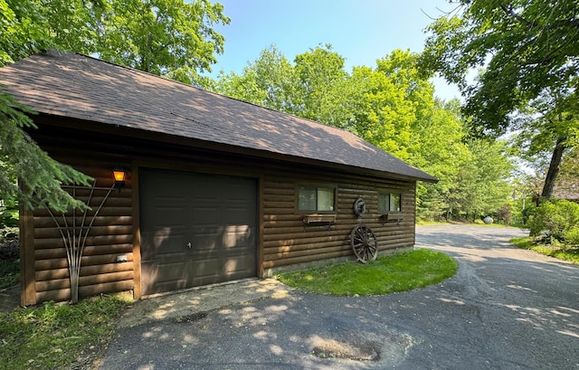 27315 Stark Lake Rd, Aitkin, MN 56431 - garage featuring driveway