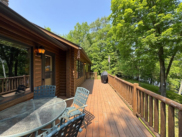 27315 Stark Lake Rd, Aitkin, MN 56431 - wooden deck with outdoor dining area