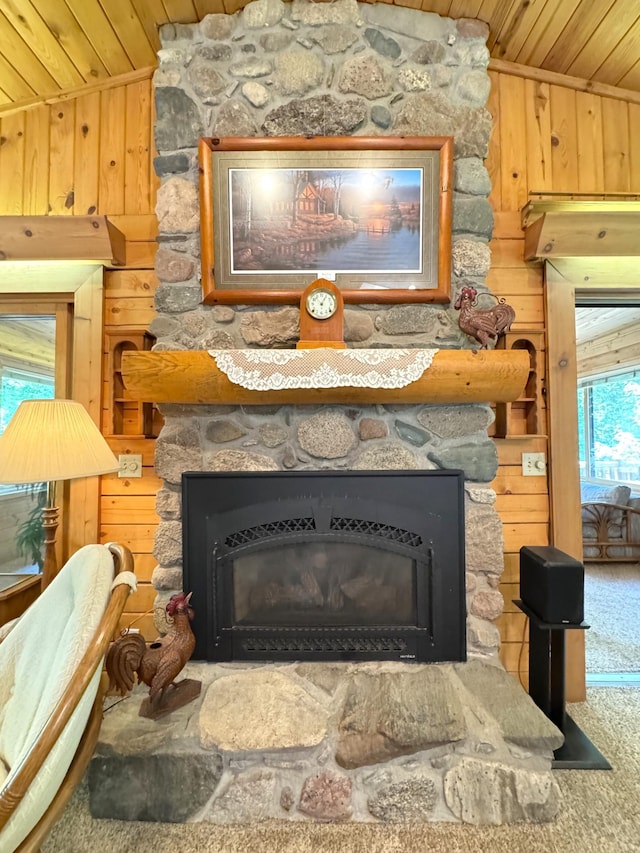 27315 Stark Lake Rd, Aitkin, MN 56431 - detailed view of wood ceiling, wooden walls, a stone fireplace, and carpet floors