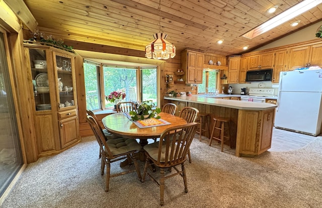 27315 Stark Lake Rd, Aitkin, MN 56431 - dining room with vaulted ceiling, light carpet, wooden ceiling, and recessed lighting