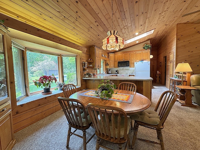 27315 Stark Lake Rd, Aitkin, MN 56431 - dining room featuring light carpet, lofted ceiling, wooden ceiling, wooden walls, and a chandelier