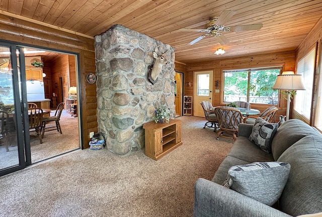 27315 Stark Lake Rd, Aitkin, MN 56431 - carpeted living area featuring wood ceiling, a ceiling fan, and wood walls