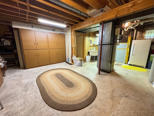 27315 Stark Lake Rd, Aitkin, MN 56431 - unfinished basement with freestanding refrigerator and heating unit