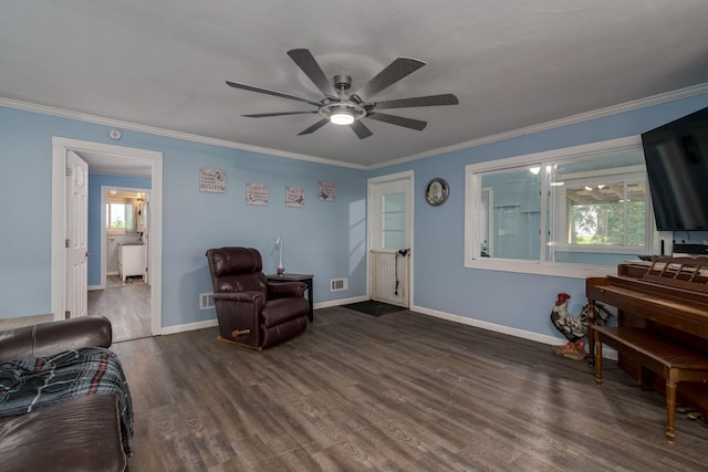 43867 County Road 15, New Sweden Twp, MN 56074 - living room with wood finished floors, plenty of natural light, a ceiling fan, and ornamental molding