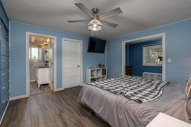 43867 County Road 15, New Sweden Twp, MN 56074 - bedroom featuring dark wood finished floors and a ceiling fan