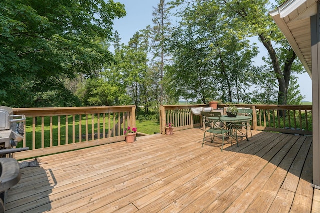 43867 County Road 15, New Sweden Twp, MN 56074 - wooden terrace featuring outdoor dining space and a yard