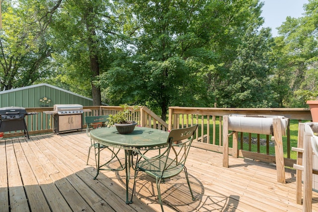 43867 County Road 15, New Sweden Twp, MN 56074 - wooden terrace featuring area for grilling and outdoor dining space