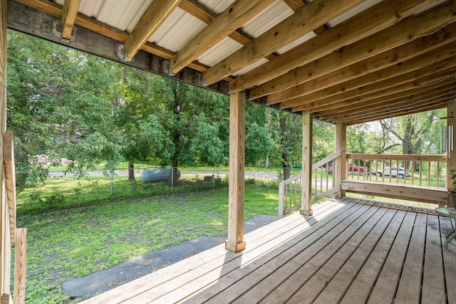 43867 County Road 15, New Sweden Twp, MN 56074 - wooden terrace with a fenced backyard and view of scattered trees