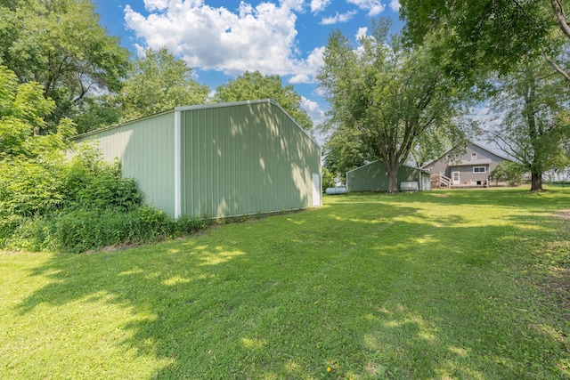 43867 County Road 15, New Sweden Twp, MN 56074 - view of green lawn with an outbuilding