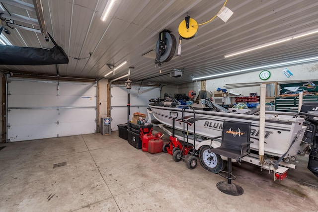 43867 County Road 15, New Sweden Twp, MN 56074 - garage featuring a garage door opener