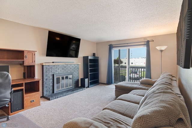 1129 22nd St S Unit B12, Fargo, ND 58103 - living room with carpet flooring, a brick fireplace, and a textured ceiling
