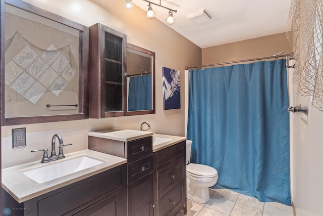 1129 22nd St S Unit B12, Fargo, ND 58103 - full bath featuring vanity, tile patterned floors, and a shower with curtain