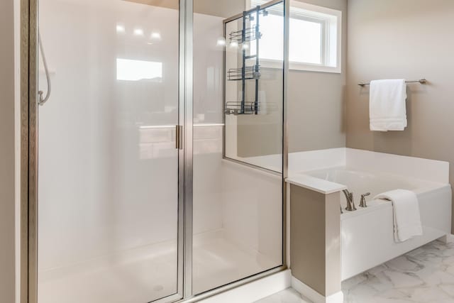 10329 Kentucky Ave N, Brooklyn Park, MN 55445 - full bathroom with a stall shower, a bath, and marble finish flooring