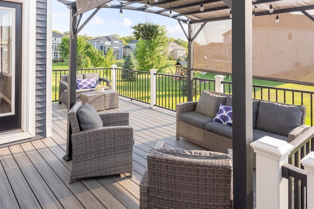 10329 Kentucky Ave N, Brooklyn Park, MN 55445 - wooden terrace with an outdoor living space, a residential view, a yard, and a pergola