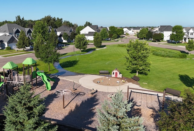 10329 Kentucky Ave N, Brooklyn Park, MN 55445 - view of community featuring a residential view and a yard