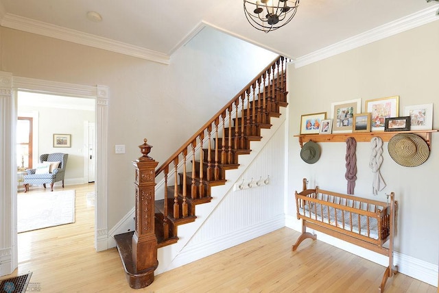 5560 County Road 3, Kindred, ND 58051 - stairs with wood finished floors, ornamental molding, and baseboards
