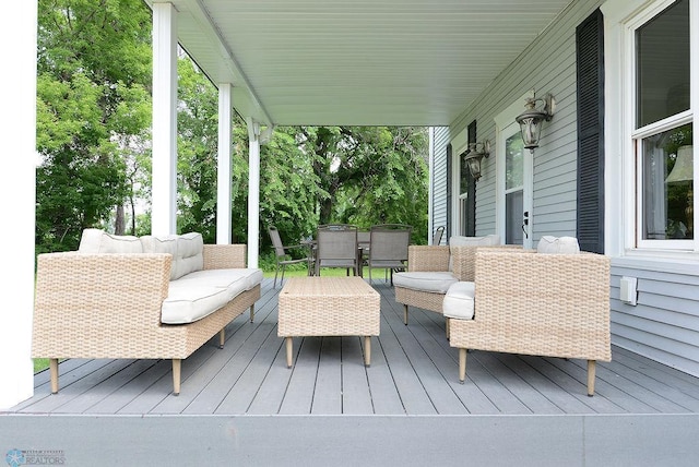 5560 County Road 3, Kindred, ND 58051 - wooden deck featuring an outdoor hangout area