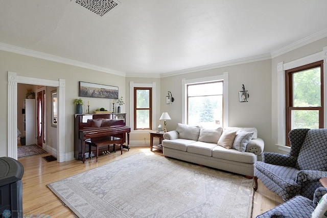 5560 County Road 3, Kindred, ND 58051 - living area with ornamental molding, light wood-style flooring, and baseboards