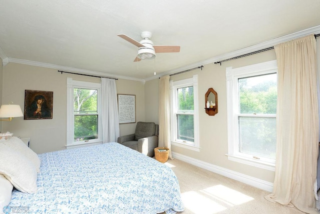 5560 County Road 3, Kindred, ND 58051 - bedroom with carpet, crown molding, baseboards, multiple windows, and ceiling fan