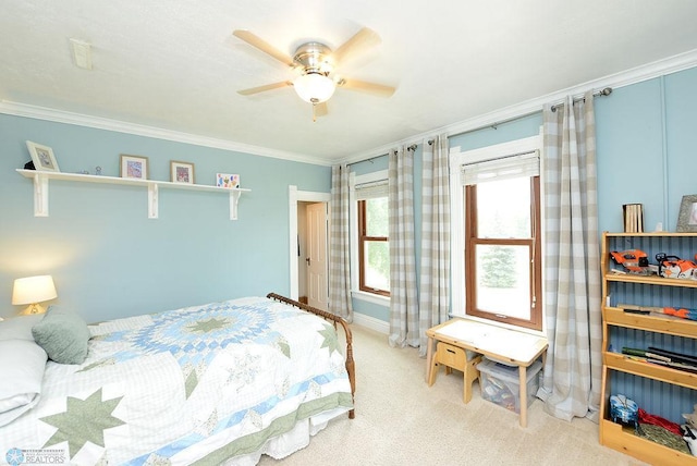 5560 County Road 3, Kindred, ND 58051 - bedroom featuring crown molding, light carpet, baseboards, and a ceiling fan