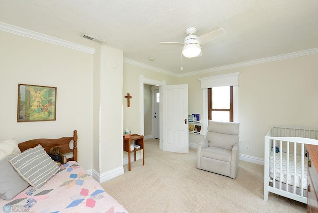 5560 County Road 3, Kindred, ND 58051 - bedroom with ornamental molding, baseboards, carpet flooring, and a ceiling fan