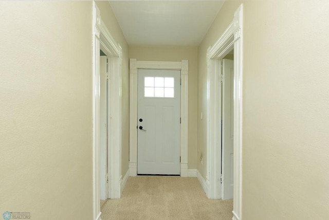 5560 County Road 3, Kindred, ND 58051 - doorway featuring light carpet and baseboards