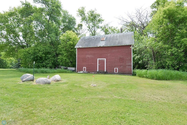 5560 County Road 3, Kindred, ND 58051 - view of grassy yard featuring a barn and an outbuilding