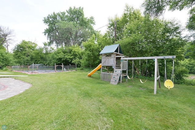5560 County Road 3, Kindred, ND 58051 - view of yard with a playground and view of wooded area
