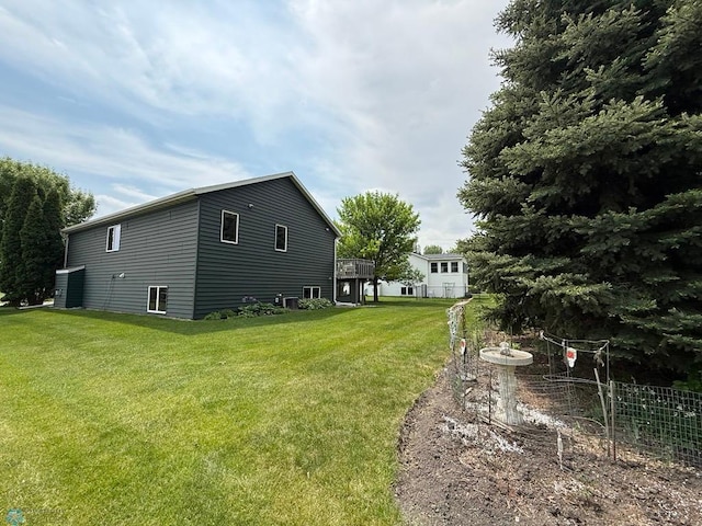 521 Kroshus Dr, Dilworth, MN 56529 - view of property exterior with a yard