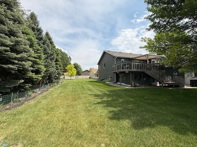 521 Kroshus Dr, Dilworth, MN 56529 - view of yard featuring a deck and stairway