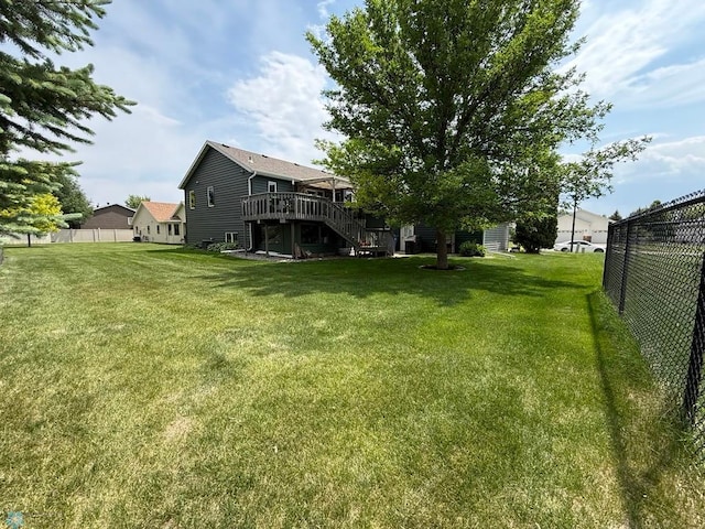 521 Kroshus Dr, Dilworth, MN 56529 - view of yard with stairs and a deck