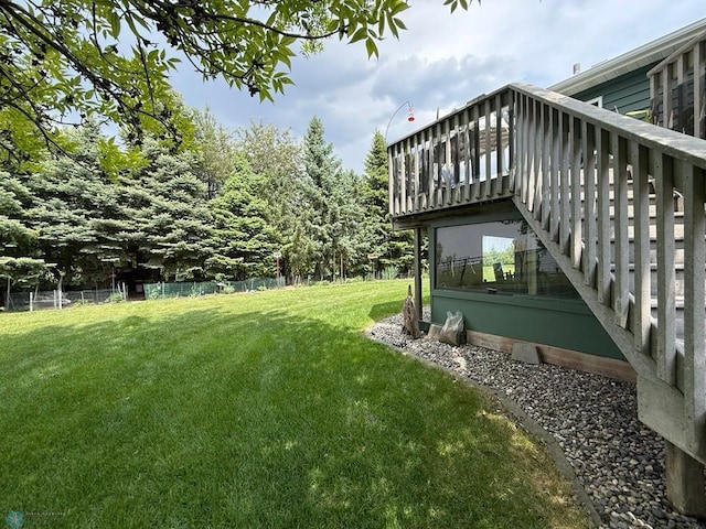 521 Kroshus Dr, Dilworth, MN 56529 - view of yard with a wooden deck