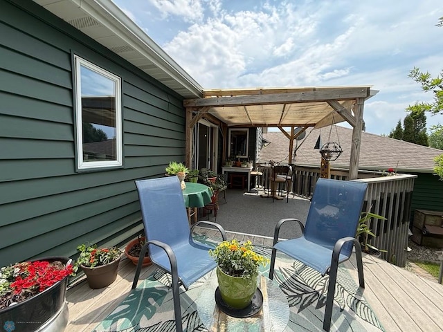 521 Kroshus Dr, Dilworth, MN 56529 - deck featuring outdoor dining space and a patio