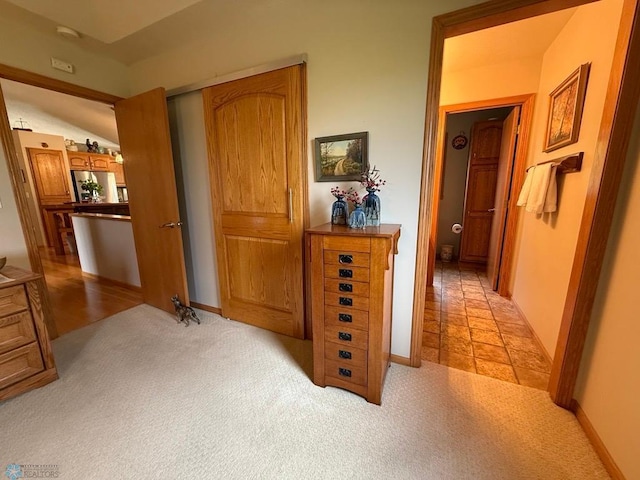 521 Kroshus Dr, Dilworth, MN 56529 - hall featuring light carpet and baseboards