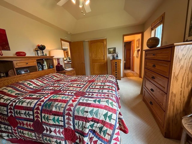 521 Kroshus Dr, Dilworth, MN 56529 - bedroom featuring light colored carpet, a tray ceiling, a closet, and ceiling fan