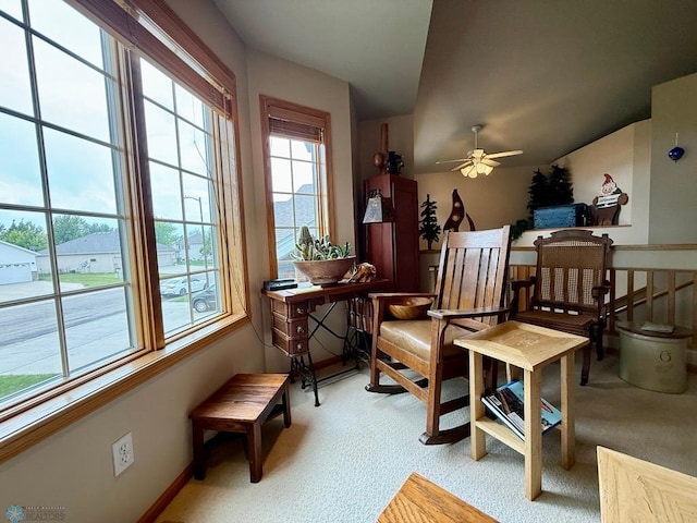 521 Kroshus Dr, Dilworth, MN 56529 - living area featuring light carpet and a ceiling fan