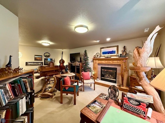 521 Kroshus Dr, Dilworth, MN 56529 - carpeted living area featuring a tile fireplace and a textured ceiling