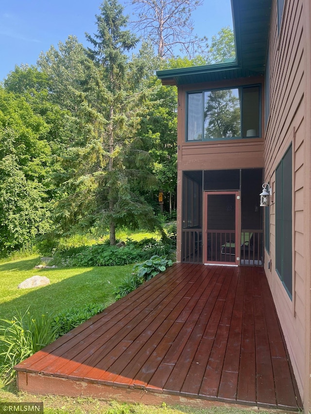 37760 Dove St Unit 14, Aitkin, MN 56431 - deck featuring a lawn
