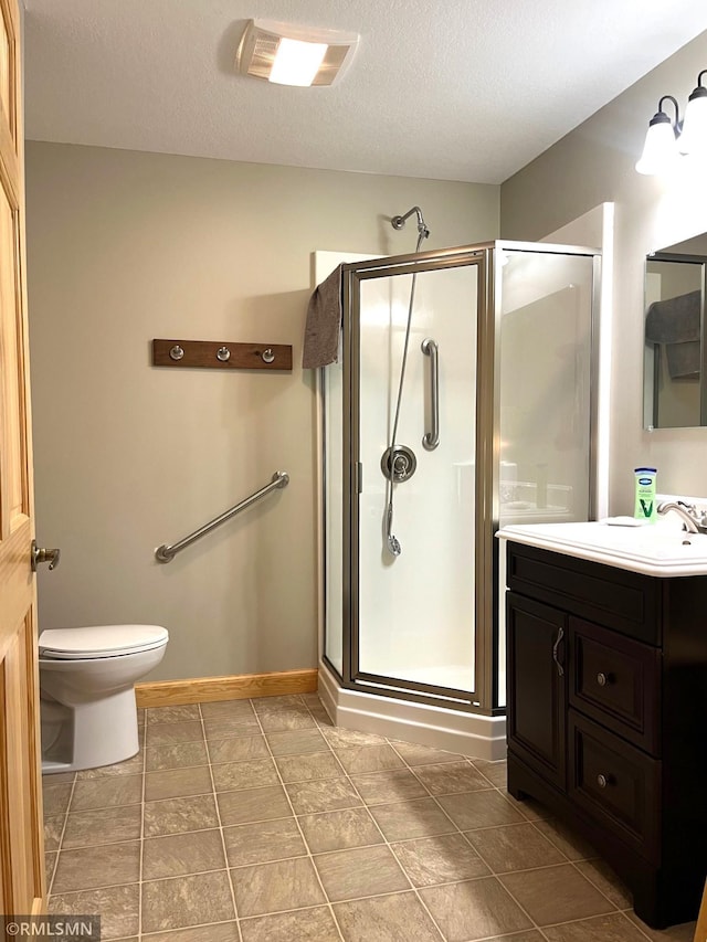37760 Dove St Unit 14, Aitkin, MN 56431 - full bath featuring vanity, a stall shower, tile patterned flooring, and a textured ceiling
