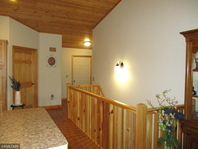 37760 Dove St Unit 14, Aitkin, MN 56431 - hallway featuring wooden ceiling and an upstairs landing