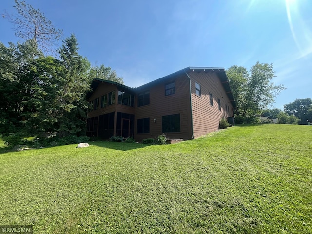 37760 Dove St Unit 14, Aitkin, MN 56431 - rear view of property with a lawn