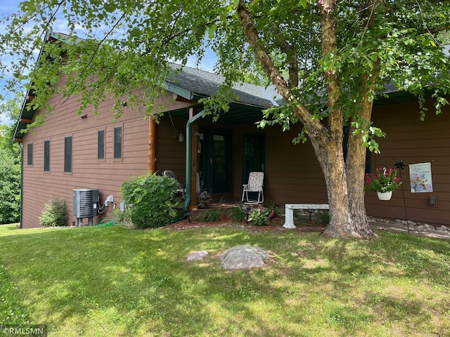 37760 Dove St Unit 14, Aitkin, MN 56431 - rear view of house featuring a lawn