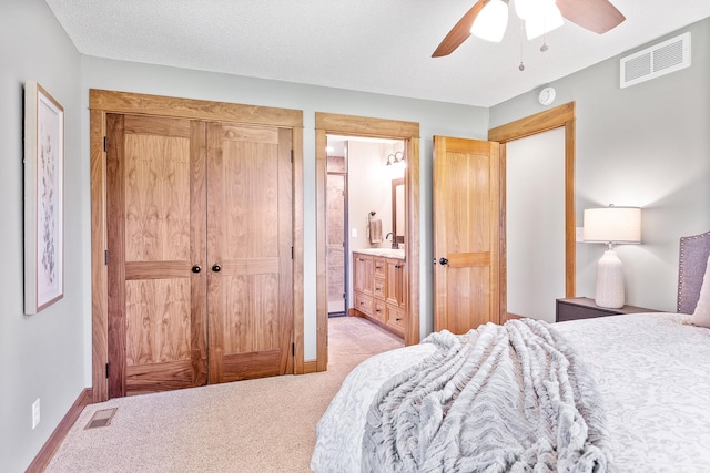 3546 230th St E, Prior Lake, MN 55372 - bedroom featuring light colored carpet, connected bathroom, and a ceiling fan