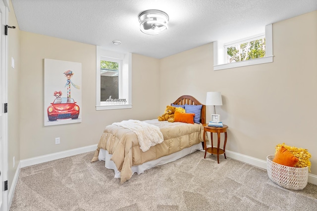 3546 230th St E, Prior Lake, MN 55372 - carpeted bedroom with a textured ceiling and multiple windows