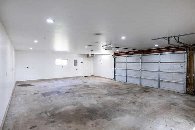 3546 230th St E, Prior Lake, MN 55372 - garage featuring recessed lighting, electric panel, and a garage door opener