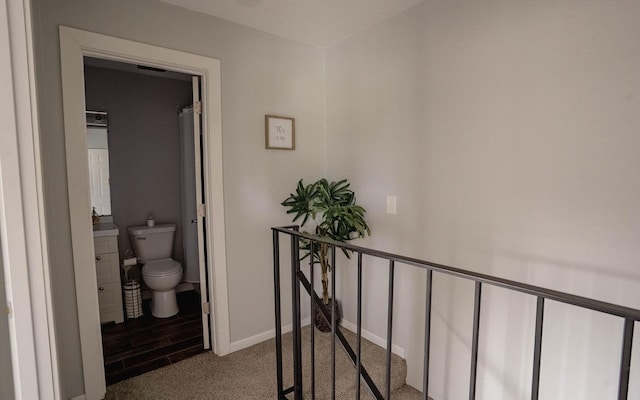 6303 84th Ct N, Brooklyn Park, MN 55445 - hallway with carpet floors and baseboards
