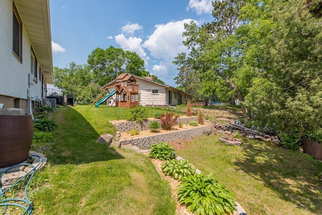 471 Tyrol Dr, Brainerd, MN 56401 - view of grassy yard featuring a playground